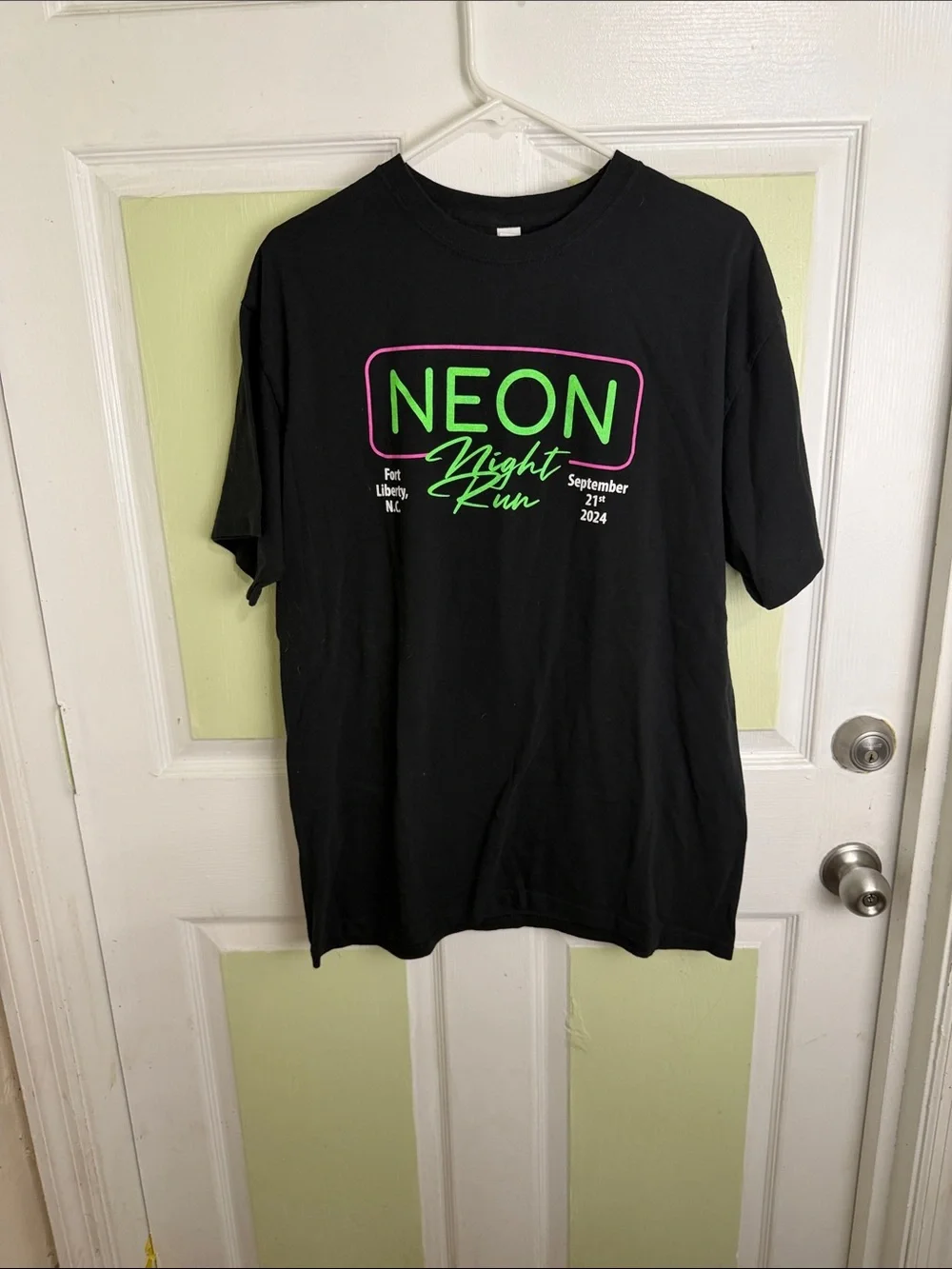 (2353) Gildan Black Short Sleeve Tee with Neon Green and Pink Graphic, Size: L